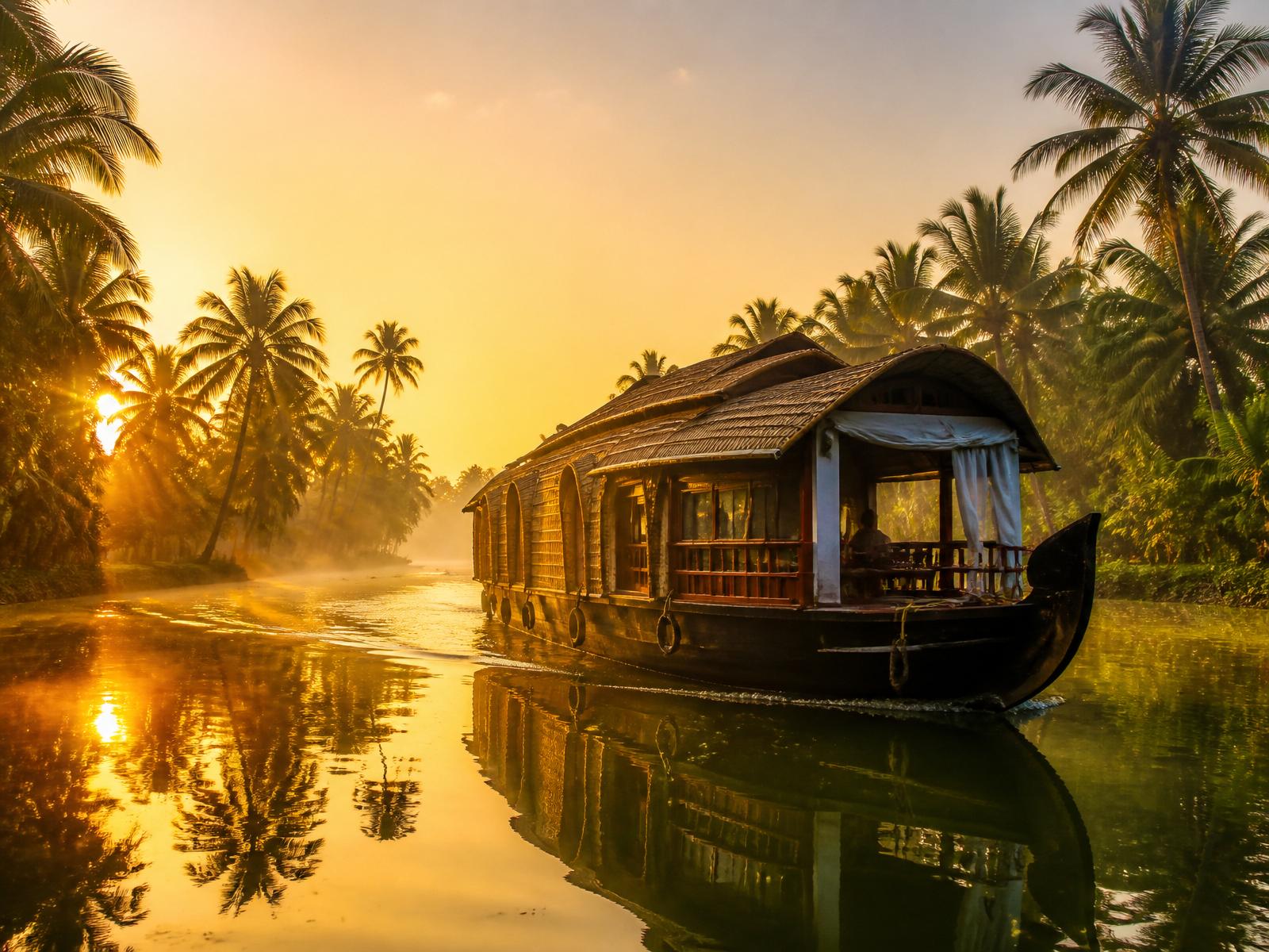 Luxury houseboat travelling through Kerala backwaters